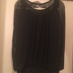 Sheer blouse with black tank